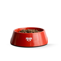 Front view of Oh-riginal Red Bowl with glossy red finish, rubber non-slip base, filled with kibble on white background