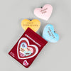 Recycled plush toy with a heart design and text "I Effing Love You!" surrounded by three plush hearts labeled "You Are My Sunshine", "Love You", and "Be Mine" on a light background.
